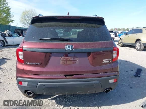 2021 Honda Passport Touring z VIN 5FNYF8H91MB022986, wystawiony jako IAAI lot #42077321 z przebiegiem 20 497 mil mil oraz . Historia ofert i sprzedaży dostępna na DreamBid. Obrazek 16.