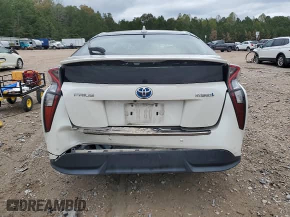 2016 Toyota Prius Three Touring с VIN JTDKARFU5G3008074, выставлен на аукционе Copart как лот 82451535 с пробегом 106 499 миль миль и Списание • Salvage title. История ставок и продаж доступна на DreamBid. Изображение 6.