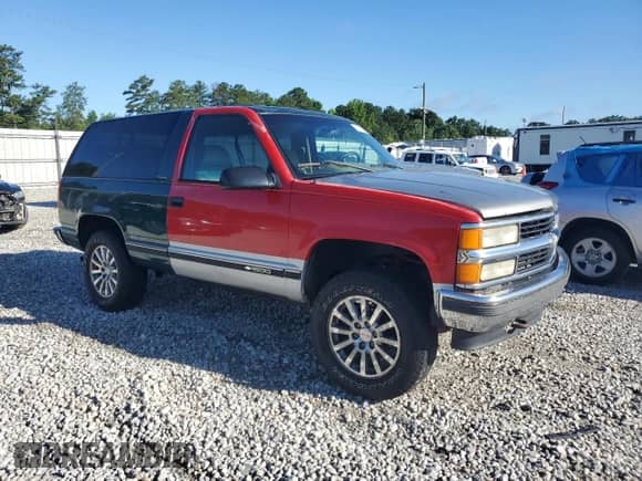 1996 Chevrolet Tahoe с VIN 3GNEK18R3TG159899, выставлен на аукционе Copart как лот 61131635 с пробегом 174 293 миль миль и Списание • Salvage title. История ставок и продаж доступна на DreamBid. Изображение 4.