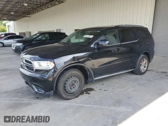 2015 Dodge Durango SXT with VIN 1C4RDJAG8FC723146, listed as a Copart auction lot 68673035 with 134,481 mi miles and Salvage title. Bid and sale history available at DreamBid. Image 1.