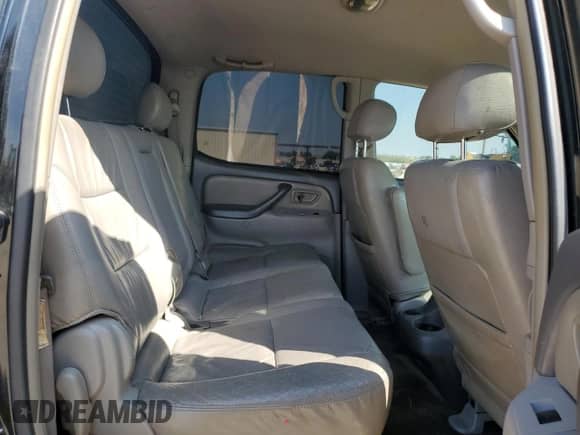 2004 Toyota Tundra SR5 z VIN 5TBET34104S453368, wystawiony jako Copart lot #87469845 z przebiegiem 271 497 mil mil oraz Czysty tytuł • Clean title. Historia ofert i sprzedaży dostępna na DreamBid. Obrazek 10.
