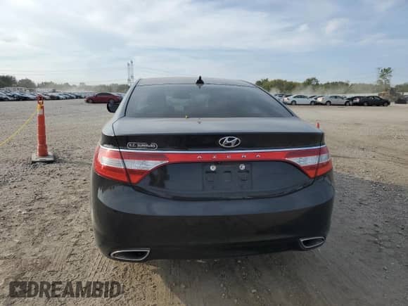 2014 Hyundai Azera with VIN KMHFG4JG7EA414236, listed as a Copart auction lot 71658544 with 143,404 mi miles and Salvage title. Bid and sale history available at DreamBid. Image 6.
