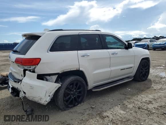 2017 Jeep Grand Cherokee Overland with VIN 1C4RJECG4HC740042, listed as a Copart auction lot 83797275 with 67,534 mi miles and Salvage title. Bid and sale history available at DreamBid. Image 3.