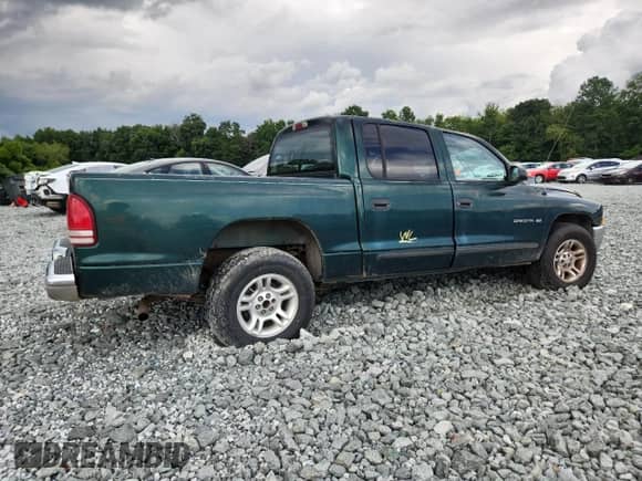 2001 Dodge Dakota Sport with VIN 1B7HL2AX11S287503, listed as a Copart auction lot 65212095 with Not provided miles and Salvage title. Bid and sale history available at DreamBid. Image 3.
