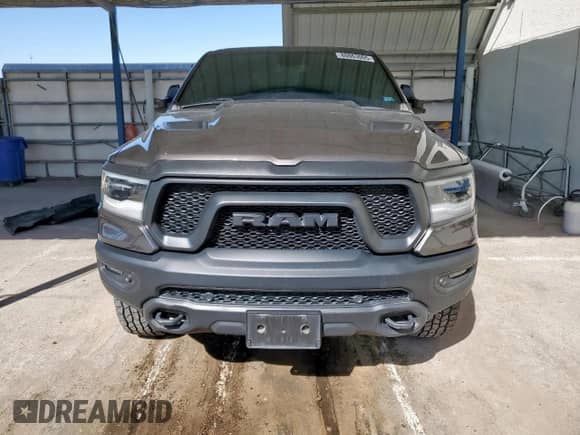 2019 Ram 1500 Rebel z VIN 1C6SRFLT3KN598363, wystawiony jako Copart lot #80063005 z przebiegiem 52 624 mil mil oraz Szkoda całkowita • Salvage title. Historia ofert i sprzedaży dostępna na DreamBid. Obrazek 5.
