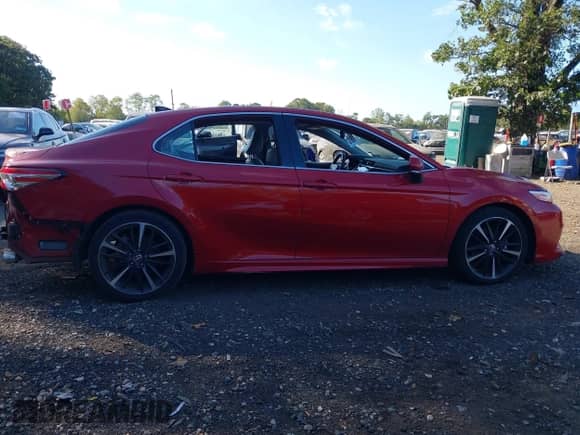 2020 Toyota Camry XSE z VIN 4T1K61AKXLU395343, wystawiony jako IAAI lot #43350130 z przebiegiem 79 904 mil mil oraz . Historia ofert i sprzedaży dostępna na DreamBid. Obrazek 13.