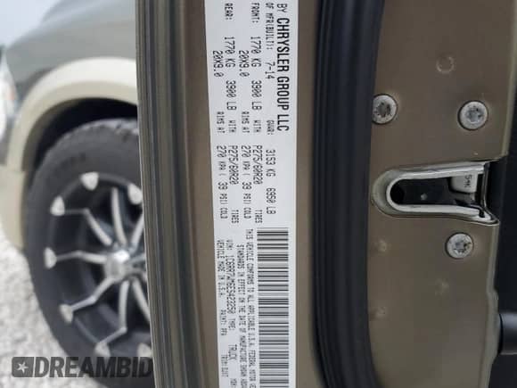 2014 Ram 1500 Longhorn Limited z VIN 1C6RR7WM6ES423250, wystawiony jako Copart lot #69193804 z przebiegiem 148 863 mil mil oraz Szkoda całkowita • Salvage title. Historia ofert i sprzedaży dostępna na DreamBid. Obrazek 12.