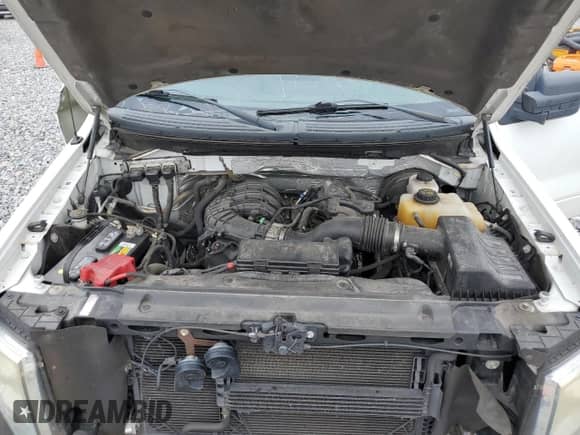 2013 Ford F-150 XL z VIN 1FTMF1CM4DKF21298, wystawiony jako Copart lot #83977155 z przebiegiem 57 853 mil mil oraz Szkoda całkowita • Salvage title. Historia ofert i sprzedaży dostępna na DreamBid. Obrazek 11.