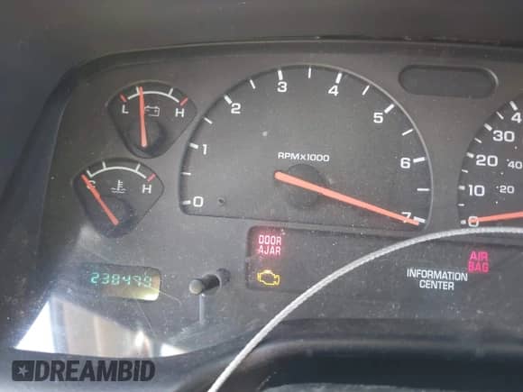 2004 Dodge Dakota Sport with VIN 1D7HG38N84S709758, listed as a IAAI auction lot 42168491 with 238,479 mi miles and . Bid and sale history available at DreamBid. Image 7.