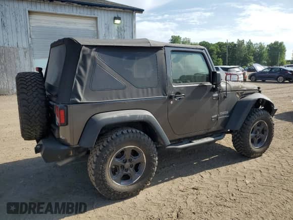 2018 Jeep Wrangler Sport with VIN 1C4AJWAGXJL897599, listed as a Copart auction lot 60906105 with Not provided miles and Clean title. Bid and sale history available at DreamBid. Image 3.