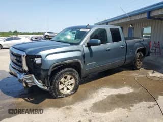 2014 GMC Sierra 1500 SLE z VIN 1GTV2UECXEZ323503, wystawiony jako Copart lot #68886325 z przebiegiem 192 785 mil mil oraz Czysty tytuł • Clean title. Historia ofert i sprzedaży dostępna na DreamBid. Obrazek 1.