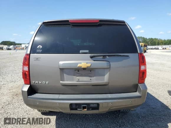 2014 Chevrolet Tahoe LS с VIN 1GNSCAE08ER176920, выставлен на аукционе Copart как лот 84654935 с пробегом 157 991 миль миль и Списание • Salvage title. История ставок и продаж доступна на DreamBid. Изображение 6.