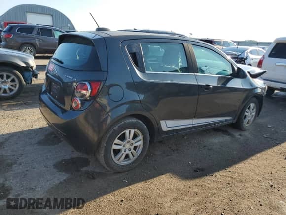 2015 Chevrolet Sonic LT с VIN 1G1JC6SG5F4124123, выставлен на аукционе Copart как лот 68841555 с пробегом 94 118 миль миль и Списание • Salvage title. История ставок и продаж доступна на DreamBid. Изображение 3.