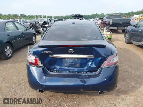 2014 Nissan Maxima SV z VIN 1N4AA5AP6EC499845, wystawiony jako IAAI lot #42824130 z przebiegiem 103 895 mil mil oraz . Historia ofert i sprzedaży dostępna na DreamBid. Obrazek 16.