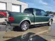 2002 Ford F-150 XLT с VIN 1FTRW07L92KA98393, выставлен на аукционе Copart как лот 70171185 с пробегом 221 225 миль миль и Списание • Salvage title. История ставок и продаж доступна на DreamBid. Изображение 3.