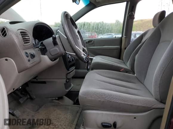 2002 Dodge Caravan Sport with VIN 2B4GP443X2R768659, listed as a Copart auction lot 65838365 with 76,735 mi miles and Clean title. Bid and sale history available at DreamBid. Image 7.