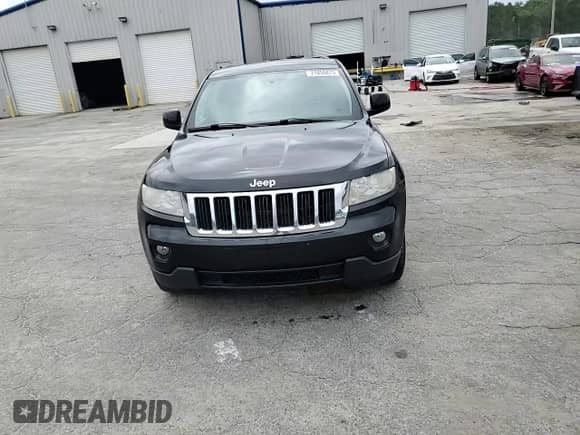 2012 Jeep Grand Cherokee Laredo z VIN 1C4RJEAG5CC258644, wystawiony jako Copart lot #71856875 z przebiegiem 188 778 mil mil oraz Szkoda całkowita • Salvage title. Historia ofert i sprzedaży dostępna na DreamBid. Obrazek 14.