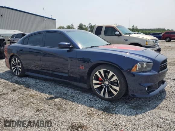 2013 Dodge Charger SRT-8 z VIN 2C3CDXEJ8DH675600, wystawiony jako Copart lot #59150215 z przebiegiem 71 231 mil mil oraz Szkoda całkowita • Salvage title. Historia ofert i sprzedaży dostępna na DreamBid. Obrazek 4.