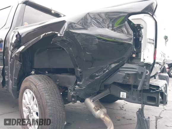 2024 Toyota Tacoma SR5 with VIN 3TMLB5JN8RM059015, listed as a IAAI auction lot 43328924 with 12,602 mi miles and . Bid and sale history available at DreamBid. Image 12.