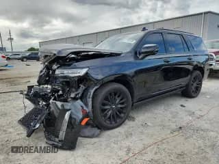 2022 Cadillac Escalade Premium Luxury с VIN 1GYS4CKL3NR173076, выставлен на аукционе Copart как лот 67193135 с пробегом 48 422 миль миль и Списание • Salvage title. История ставок и продаж доступна на DreamBid. Изображение 1.