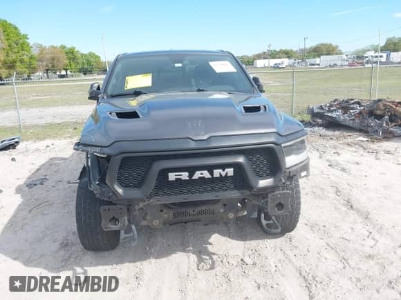 2020 Ram 1500 Rebel with VIN 1C6SRFETXLN258352, listed as a IAAI auction lot 41739065 with 199,624 mi miles and . Bid and sale history available at DreamBid. Image 6.