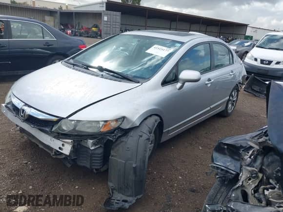 2010 Honda Civic with VIN 19XFA1E83AE006556, listed as a IAAI auction lot 41925177 with 185,477 mi miles and . Bid and sale history available at DreamBid. Image 2.