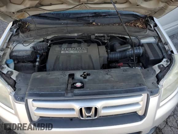 2006 Honda Pilot LX с VIN 2HKYF18116H545866, выставлен на аукционе Copart как лот 69653205 с пробегом 155 944 миль миль и Списание • Salvage title. История ставок и продаж доступна на DreamBid. Изображение 12.