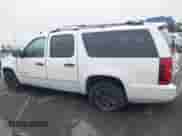 2007 Chevrolet Suburban LTZ z VIN 1GNFC16077R223342, wystawiony jako IAAI lot #42513496 z przebiegiem 256 637 mil mil oraz . Historia ofert i sprzedaży dostępna na DreamBid. Obrazek 13.
