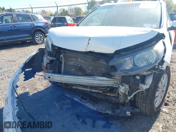 2014 Honda CR-V EX-L with VIN 5J6RM4H71EL087198, listed as a IAAI auction lot 43478877 with 156,643 mi miles and . Bid and sale history available at DreamBid. Image 6.