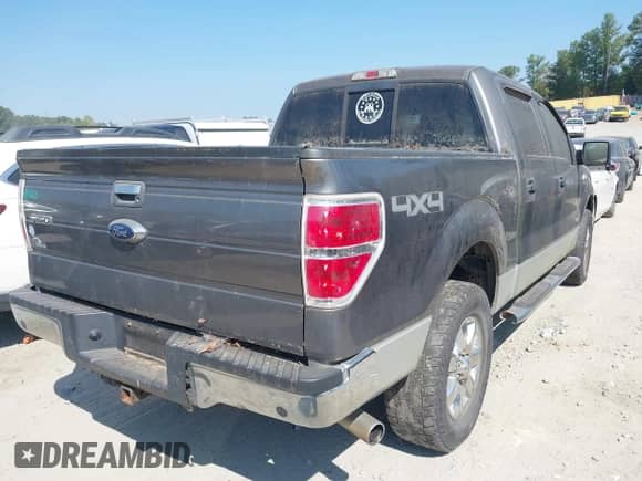 2013 Ford F-150 Lariat with VIN 1FTFW1ET5DFC93463, listed as a IAAI auction lot 43182949 with 133,397 mi miles and . Bid and sale history available at DreamBid. Image 4.