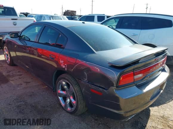 2013 Dodge Charger SXT Plus with VIN 2C3CDXHG5DH696629, listed as a IAAI auction lot 42675341 with 130,194 mi miles and . Bid and sale history available at DreamBid. Image 3.