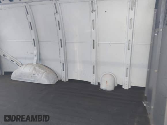 2011 Chevrolet Express Cargo with VIN 1GCSGAFX2B1112312, listed as a IAAI auction lot 42374896 with 140,571 mi miles and . Bid and sale history available at DreamBid. Image 8.