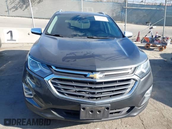 2018 Chevrolet Equinox Premier with VIN 2GNAXMEV0J6100403, listed as a IAAI auction lot 43366412 with 65,799 mi miles and . Bid and sale history available at DreamBid. Image 12.