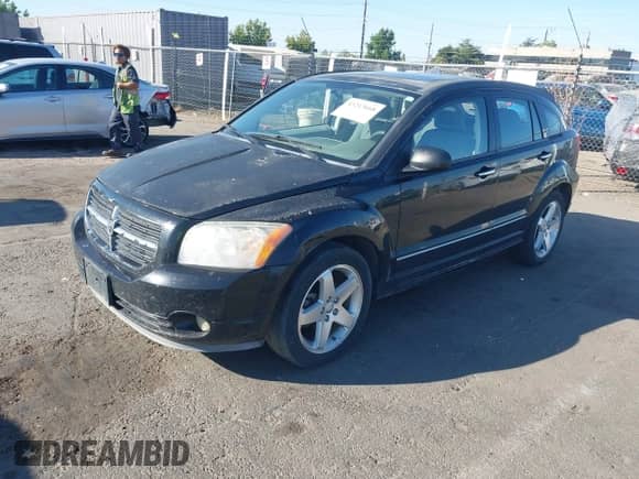 2007 Dodge Caliber R/T with VIN 1B3HE78K67D257476, listed as a IAAI auction lot 43213668 with 186,598 mi miles and . Bid and sale history available at DreamBid. Image 2.