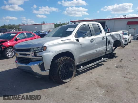 2020 Chevrolet Silverado 1500 LT with VIN 1GCRYDED5LZ240714, listed as a IAAI auction lot 41524778 with 130,782 mi miles and . Bid and sale history available at DreamBid. Image 2.