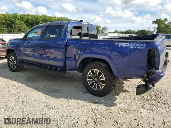 2022 Toyota Tacoma SR5 with VIN 3TYDZ5BN0NT005849, listed as a Copart auction lot 71113125 with 63,449 mi miles and Salvage title. Bid and sale history available at DreamBid. Image 2.