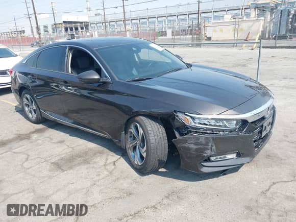2018 Honda Accord EX-L with VIN 1HGCV2F61JA017747, listed as a IAAI auction lot 42883822 with 67,853 mi miles and . Bid and sale history available at DreamBid. Image 1.