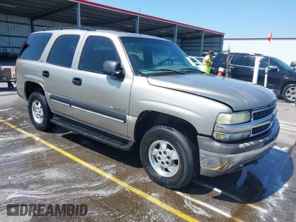 2002 Chevrolet Tahoe LT with VIN 1GNEK13Z42J275679, listed as a IAAI auction lot 42560245 with 283,711 mi miles and . Bid and sale history available at DreamBid. Image 1.