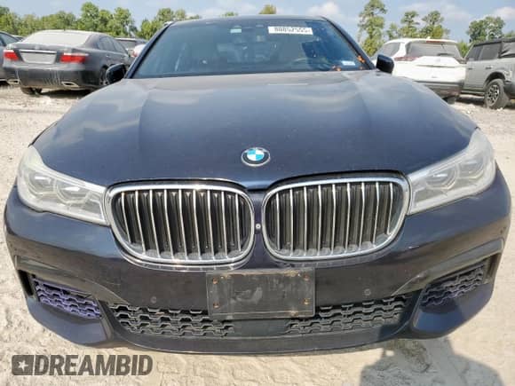 2016 BMW 7 Series 750i xDrive с VIN WBA7F2C57GG418330, выставлен на аукционе Copart как лот 80852555 с пробегом 129 555 миль миль и Списание • Salvage title. История ставок и продаж доступна на DreamBid. Изображение 5.