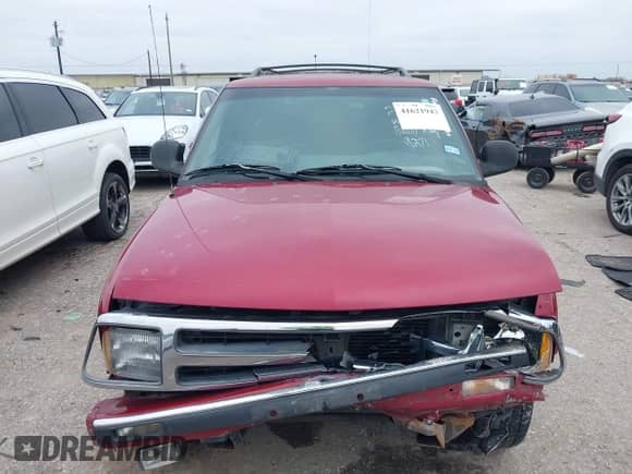 1996 Chevrolet Blazer z VIN 1GNCS13W6T2179271, wystawiony jako IAAI lot #41621943 z przebiegiem 103 498 mil mil oraz . Historia ofert i sprzedaży dostępna na DreamBid. Obrazek 12.