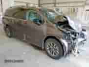 2022 Toyota Sienna LE with VIN 5TDKRKECXNS103945, listed as a Copart auction lot 69631285 with 83,793 mi miles and Salvage title. Bid and sale history available at DreamBid. Image 4.