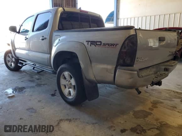 2014 Toyota Tacoma PreRunner with VIN 3TMJU4GN4EM173574, listed as a Copart auction lot 90231655 with 119,170 mi miles and Clean title. Bid and sale history available at DreamBid. Image 2.