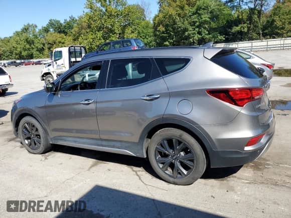 2017 Hyundai Santa Fe Ultimate z VIN 5XYZWDLA8HG489562, wystawiony jako Copart lot #71811385 z przebiegiem 72 781 mil mil oraz Szkoda całkowita • Salvage title. Historia ofert i sprzedaży dostępna na DreamBid. Obrazek 2.