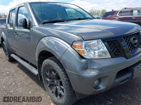 2021 Nissan Frontier Pro-4X with VIN 1N6ED0EB7MN717134, listed as a IAAI auction lot 42152523 with 71,586 mi miles and . Bid and sale history available at DreamBid. Image 6.