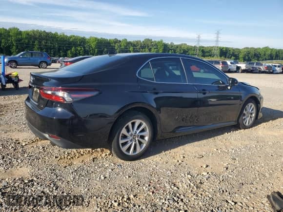 2023 Toyota Camry LE with VIN 4T1R11AK7PU084875, listed as a Copart auction lot 55857395 with 26,473 mi miles and Salvage title. Bid and sale history available at DreamBid. Image 3.
