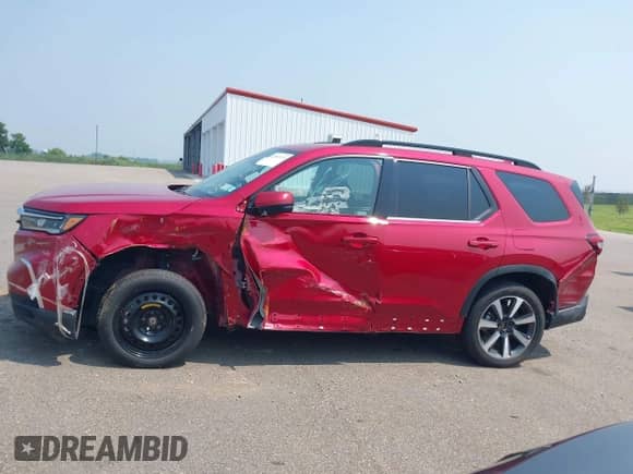 2023 Honda Pilot Elite with VIN 5FNYG1H83PB004800, listed as a IAAI auction lot 42883135 with 12,162 mi miles and . Bid and sale history available at DreamBid. Image 14.