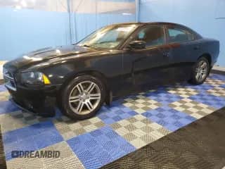 2014 Dodge Charger SXT with VIN 2C3CDXHG7EH191404, listed as a Copart auction lot 68898055 with 174,314 mi miles and Clean title. Bid and sale history available at DreamBid. Image 1.