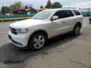 2014 Dodge Durango Limited with VIN 1C4SDJDT0EC438725, listed as a Copart auction lot 64326865 with 101,685 mi miles and Salvage title. Bid and sale history available at DreamBid. Image 1.