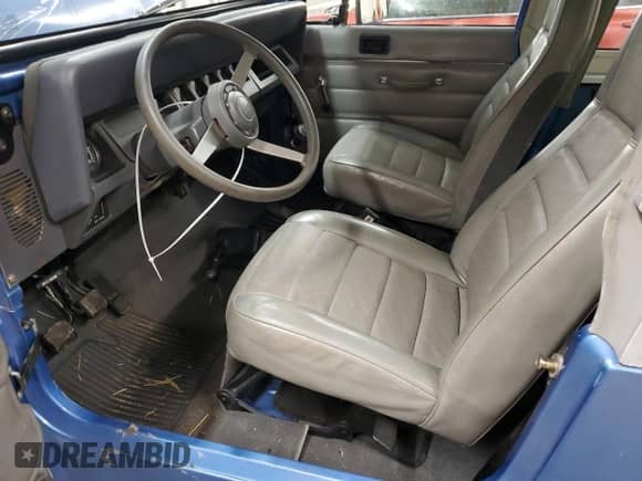 1989 Jeep Wrangler with VIN 2J4FY29M0KJ109399, listed as a Copart auction lot 72358094 with 129,730 mi miles and Salvage title. Bid and sale history available at DreamBid. Image 7.