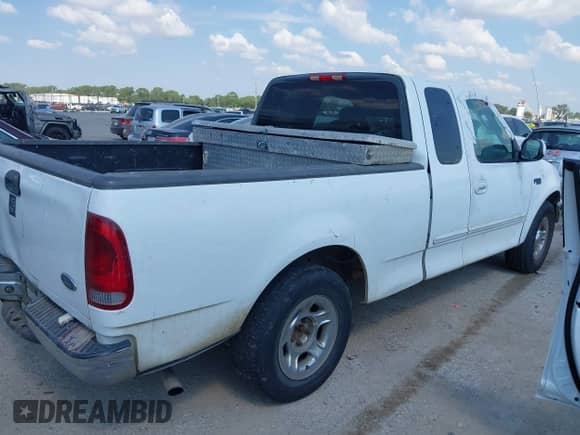 2003 Ford F-150 XL with VIN 1FTRX17203NA45592, listed as a IAAI auction lot 42952991 with Not provided miles and . Bid and sale history available at DreamBid. Image 4.